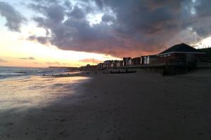 Dramatic sky over Walton on the Naze by Michael Cross